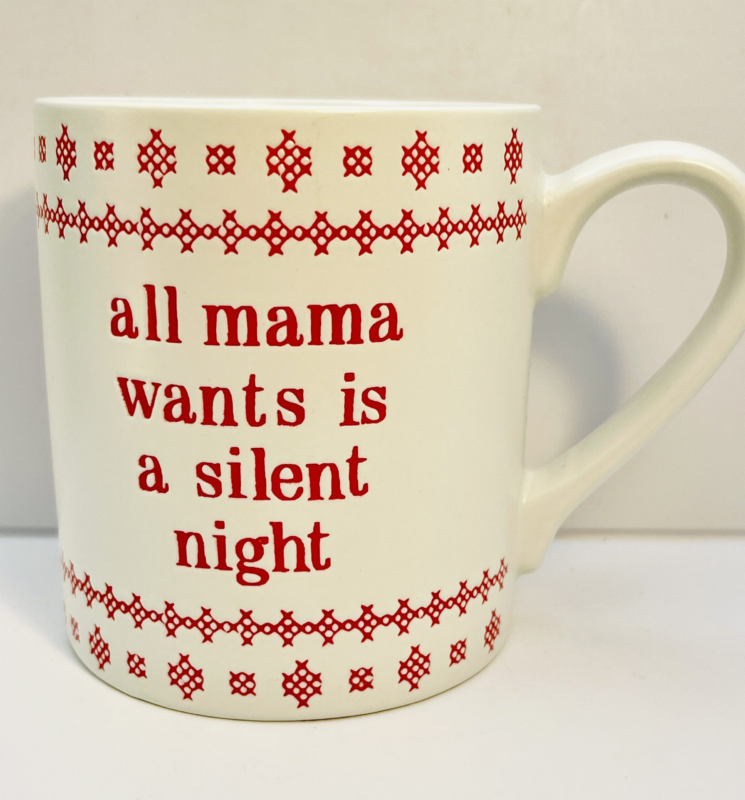 Indeed, the All Mama Wants Silent Night Mug boldly declares its message in charming red cross-stitch lettering. It’s set against a pristine white stoneware background. Especially making it an eye-catching and witty addition to any kitchen, office. Or cozy Christmas nook. This mug is ideal for moms, grandmothers, or anyone who knows that during the holiday season, a quiet moment is truly priceless.
