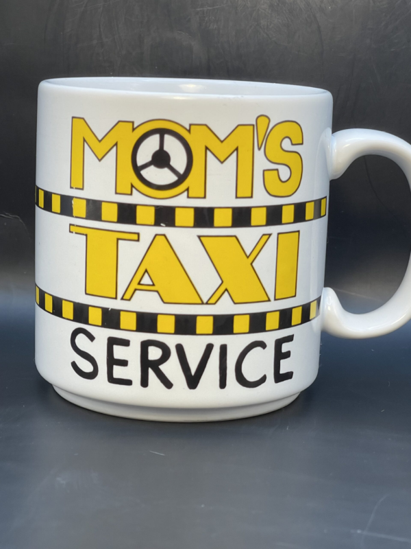 This Mom’s Taxi Service Mug by Russ Berrie is the perfect #cupofmood for the helpful mom in your life. This super cute Russ Berrie Mom Appreciation Coffee Cup is the perfect gift mug for Mother’s Day coffee cup mug.

On the front of this whimsically designed Mom’s Taxi Service Mug by Russ Berrie is an often funny and true mom saying. It says, Mom’s Taxi Service.