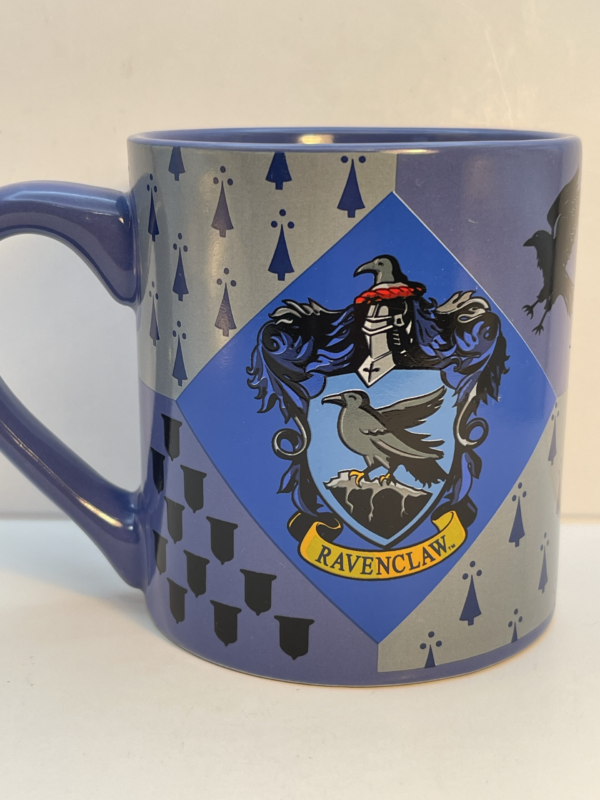 Embrace the wit and wisdom of Ravenclaw with the Harry Potter Ravenclaw House Crest Mug. It’s the perfect #cupofmood to showcase your Ravenclaw pride in style.

Indeed, this is an 18-ounce blue ceramic masterpiece that celebrates the cleverest house in all of Hogwarts.