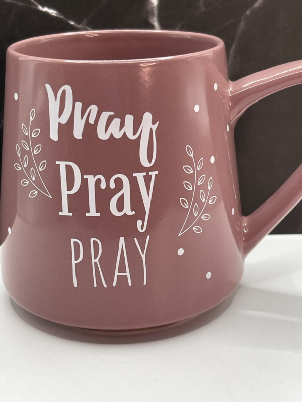 Start your day with purpose and prayer with the Pray Pray Pray Pink Mug. It’s the perfect #cupofmood and an inspiring reminder to center your heart, speak to God, and let faith lead the way.Indeed, this 14-ounce ceramic mug makes a bold and beautiful statement with its vibrant pink color. And the words “Pray Pray Pray” printed in big, crisp white letters on both sides.