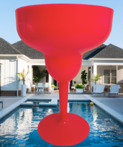Hot pink acrylic margarita glass by poolside setting for outdoor entertaining