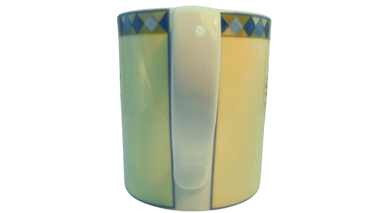 Royal Doulton Carmina Lemon Tree Mug handle view showing decorative rim border and clean handle profile