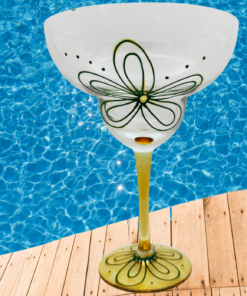 hand painted floral margarita glass styled by poolside setting with bright natural light