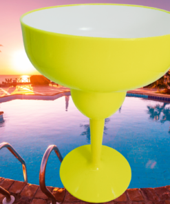 Yellow acrylic margarita glass by poolside at sunset for outdoor entertaining