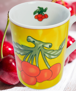 Vintage Cherry Sunshine Mug displayed with fresh cherries in a bright kitchen setting