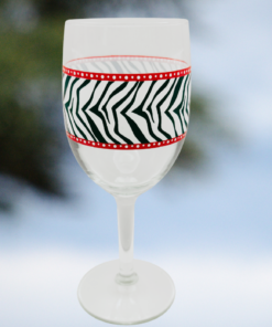 Zebra Print Wine Glass styled beside zebra in safari inspired outdoor setting