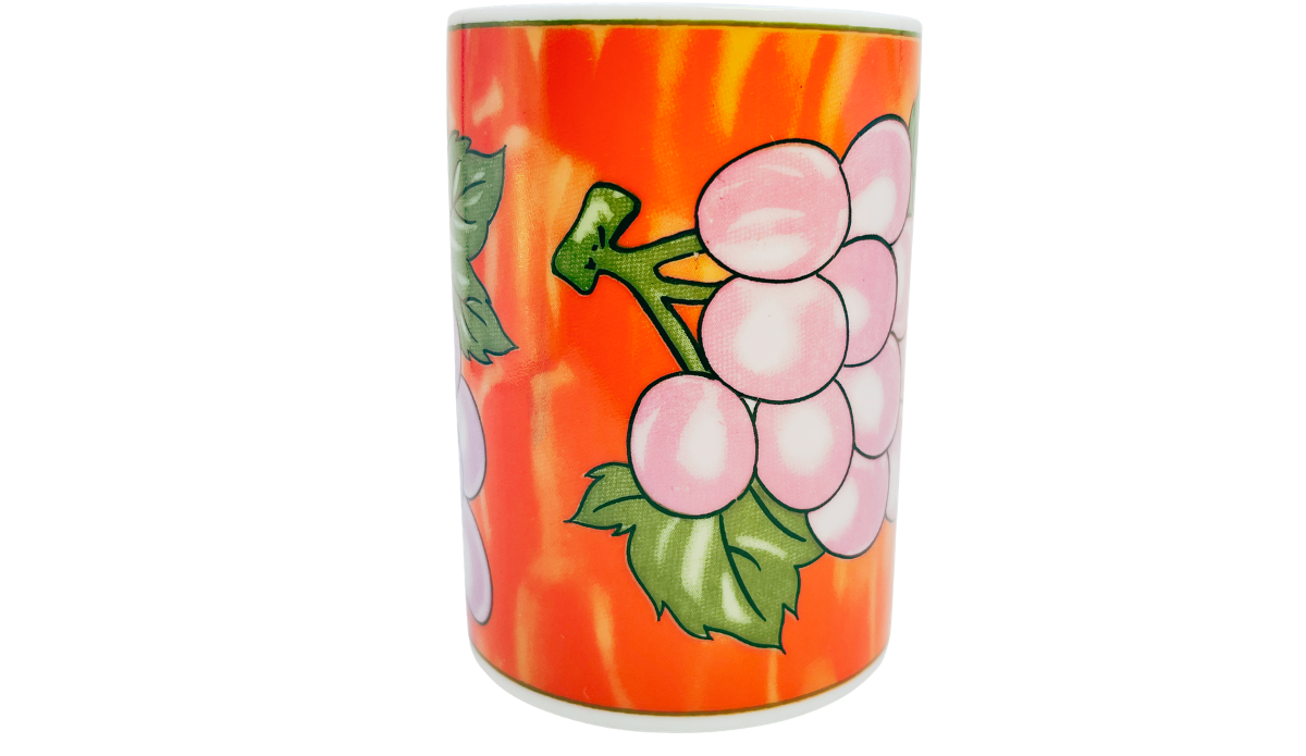 Side view of Grape Vineyard Red Coffee Mug with grape cluster and vineyard leaves