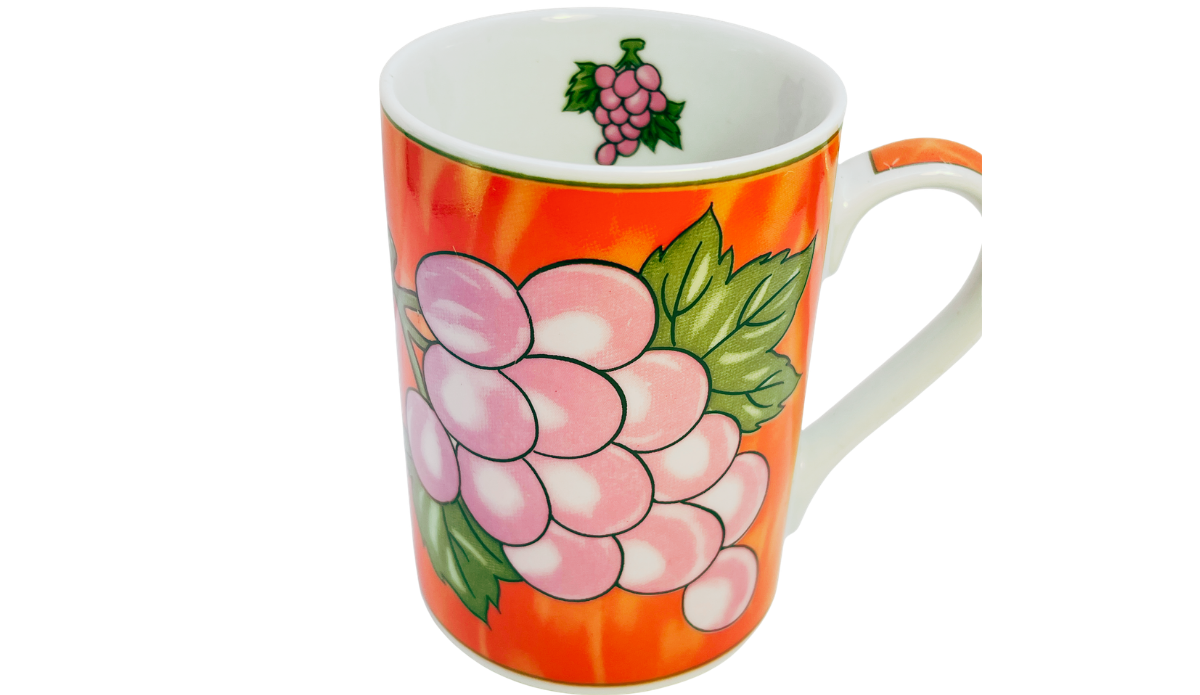 Top view of Grape Vineyard Red Coffee Mug showing white interior and grape illustration