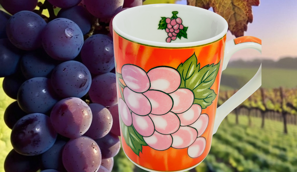 Grape Vineyard Red Coffee Mug displayed with vineyard grapes and harvest colors