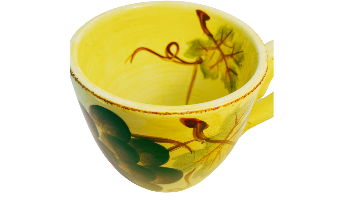 Top view of Tabletops Unlimited Vino Hand Painted Grape Mug showing decorative interior artwork