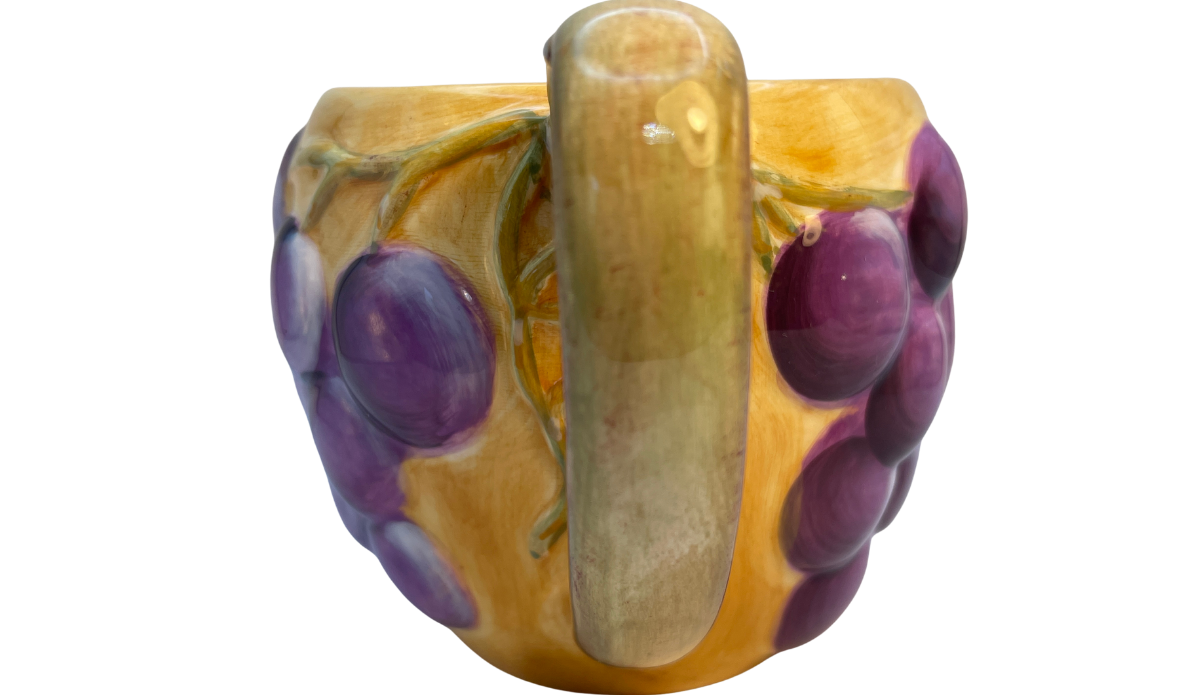 Side handle view of Gibson Hand Painted 3D Purple Grape Mug showing raised grape clusters and curved handle