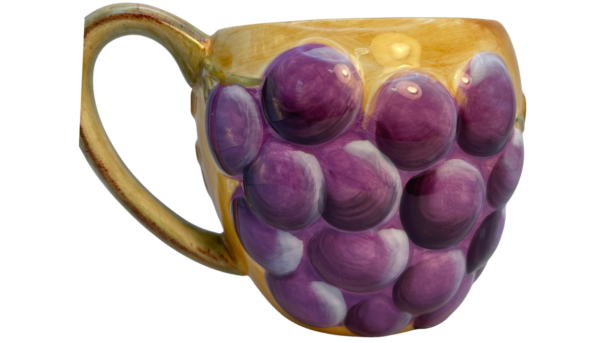 Back view of Gibson Hand Painted 3D Purple Grape Mug featuring embossed grape leaves and vineyard details