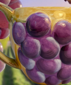 Gibson Hand Painted 3D Purple Grape Mug displayed against a vineyard backdrop with grape clusters