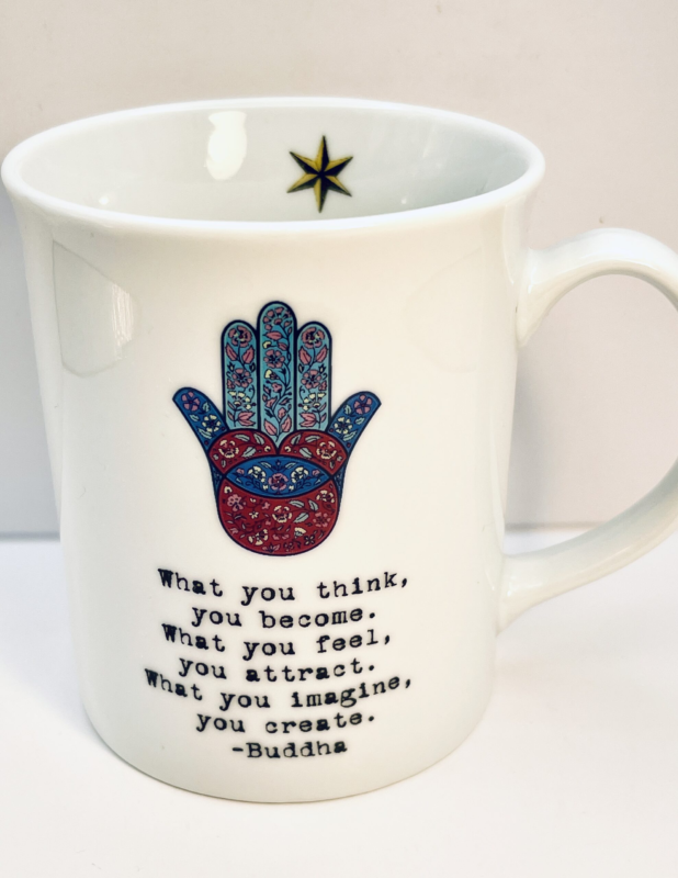 Start your mornings with mindfulness and motivation with the Buddha Hamsa Hand Mug of Inspiration! It’s the perfect #cupofmood and beacon of positivity and protection!Indeed, this beautifully designed white ceramic mug that turns your daily coffee or tea ritual into a moment of reflection and empowerment.In fact featuring an intricate Hamsa hand and a timeless Buddha quote. This mug is more than just drinkware. It’s a reminder that your thoughts, feelings, and imagination shape your reality.Not to mention, the Buddha Hamsa Hand Mug of Inspiration showcases the uplifting quote:
“What you think, you become. What you feel, you attract. What you imagine, you create.”