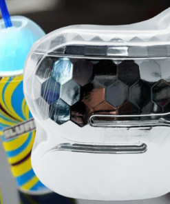 7-Eleven Slurpee Silver Disco Ball Cup displayed beside colorful Slurpee frozen drinks