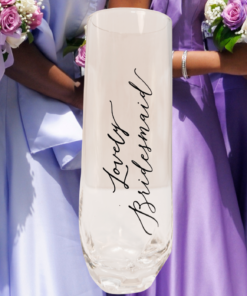 Lovely Bridesmaid Champagne Flute displayed with bridesmaids and wedding bouquets