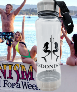 Hedonism II Negril Jamaica Souvenir Water Bottle displayed over the famous Hedonism II waterfront sign in Jamaica