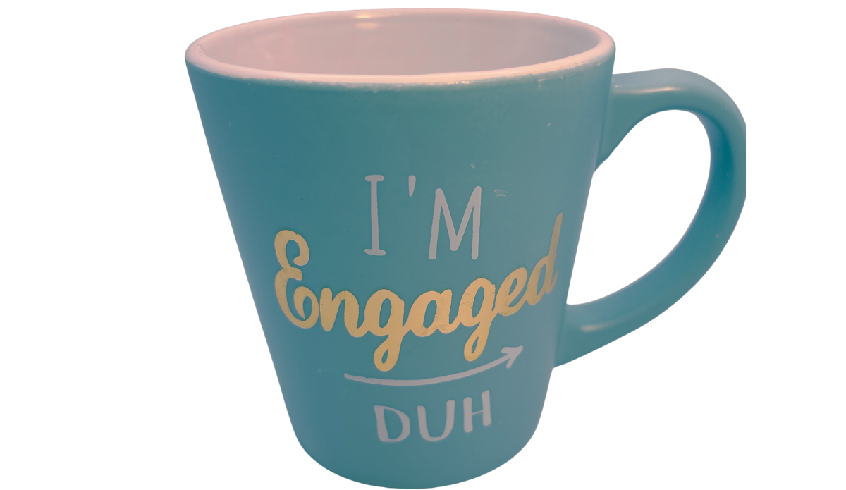 I'm Engaged Duh Mug angled front view with gold engagement lettering