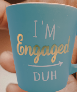 I'm Engaged Duh Mug displayed beside engagement ring lifestyle scene