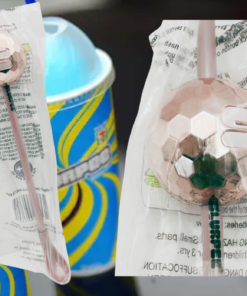Rose gold Slurpee disco ball light-up straw displayed with colorful Slurpee drinks