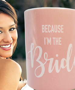 Because I'm The Bride Pink Wedding Mug displayed with smiling bride wedding themed scene