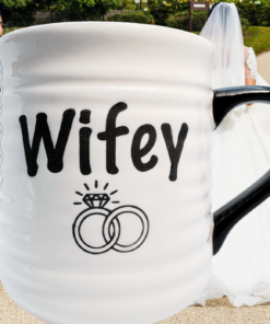 Wifey Wedding Rings Mug displayed with wedding accessories and bridal details