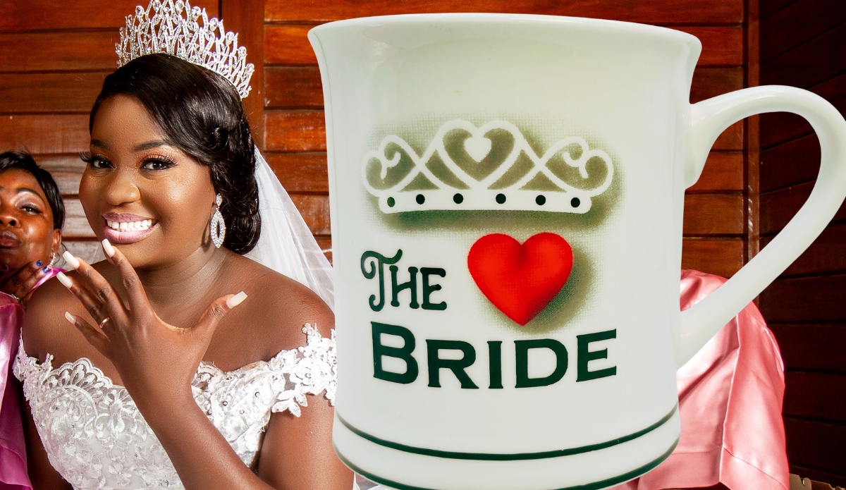 The Bride Tiara Heart Mug displayed with smiling bride in wedding attire