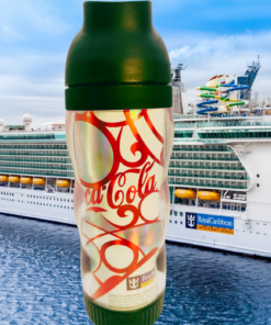 Royal Caribbean Coca-Cola Souvenir Thermal Tumbler displayed with Royal Caribbean cruise ship background