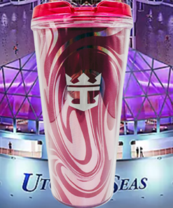 Royal Caribbean Pink Tumbler displayed with Royal Caribbean cruise ship background