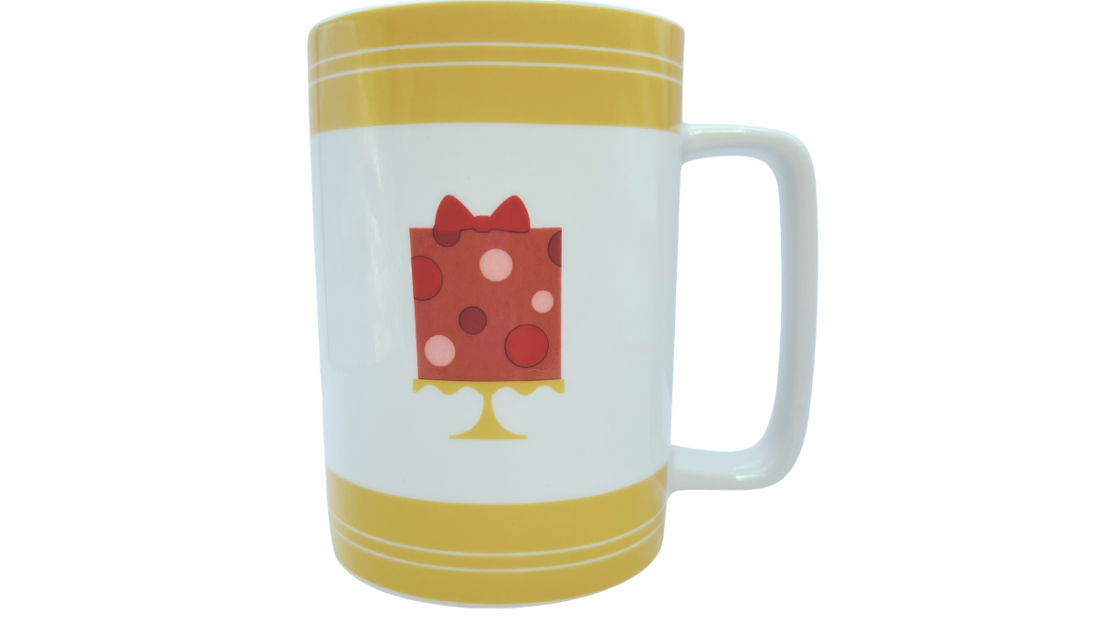 Cake Boss Yellow Mini Cakes Porcelain Mug with whimsical gift box cake artwork and yellow accent bands