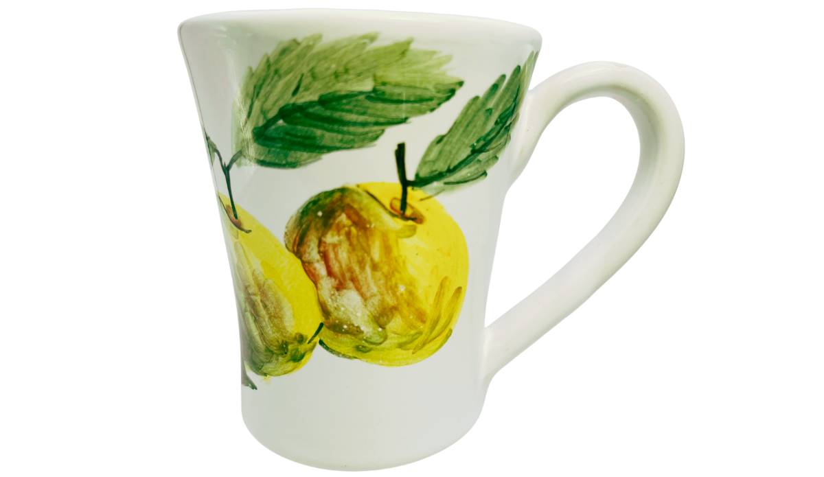 Susan Rubin Golden Apple Mug front view with hand-painted golden-yellow apples, layered green leaves, flared rim, and white handle.