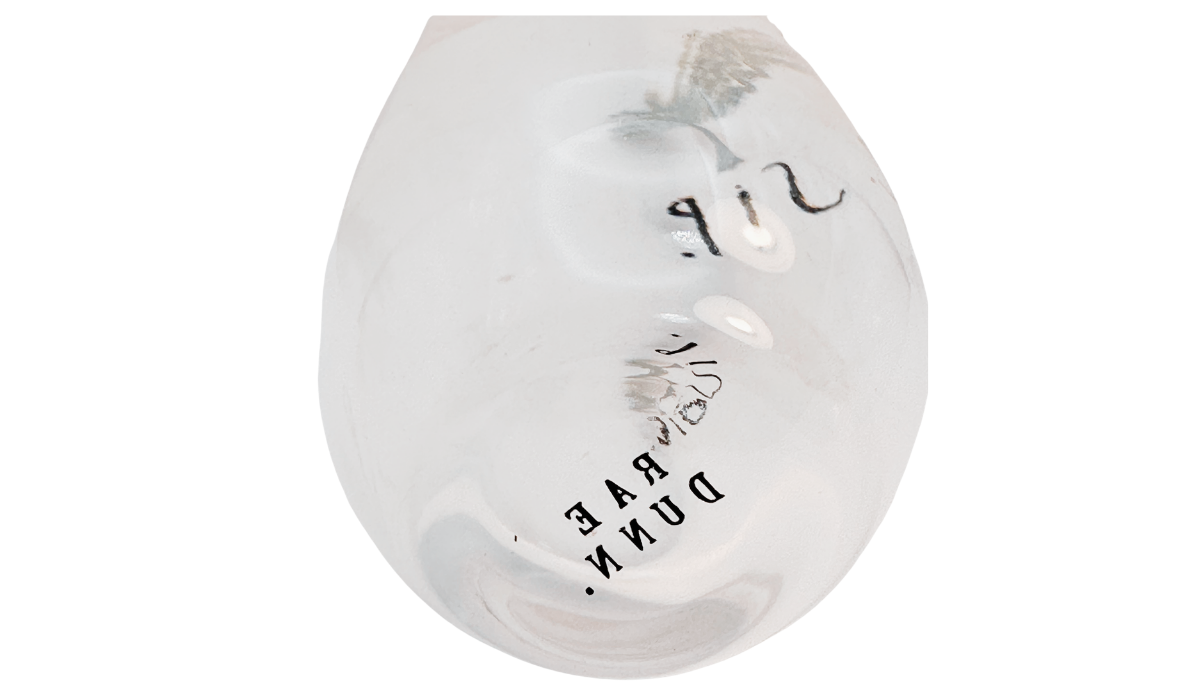 Bottom of Rae Dunn SIP champagne flute showing Rae Dunn maker's mark