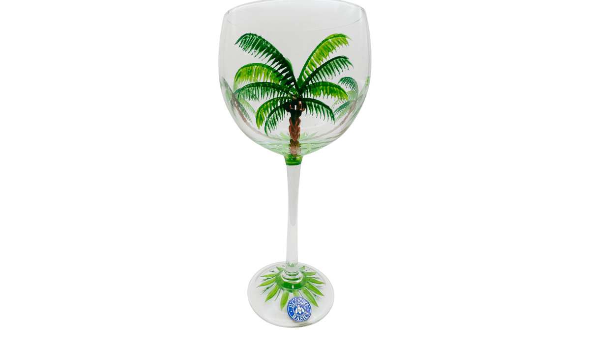 Block Basics Palm Breeze wine glass showing wraparound tropical palm trees left side