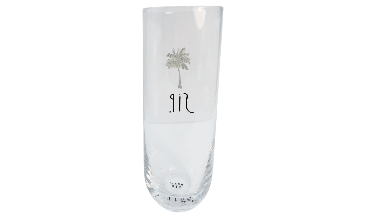 Bottom of Rae Dunn SIP champagne flute showing Rae Dunn maker's mark