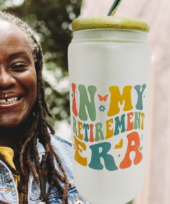 In My Retirement Era Tumbler displayed with smiling retired woman