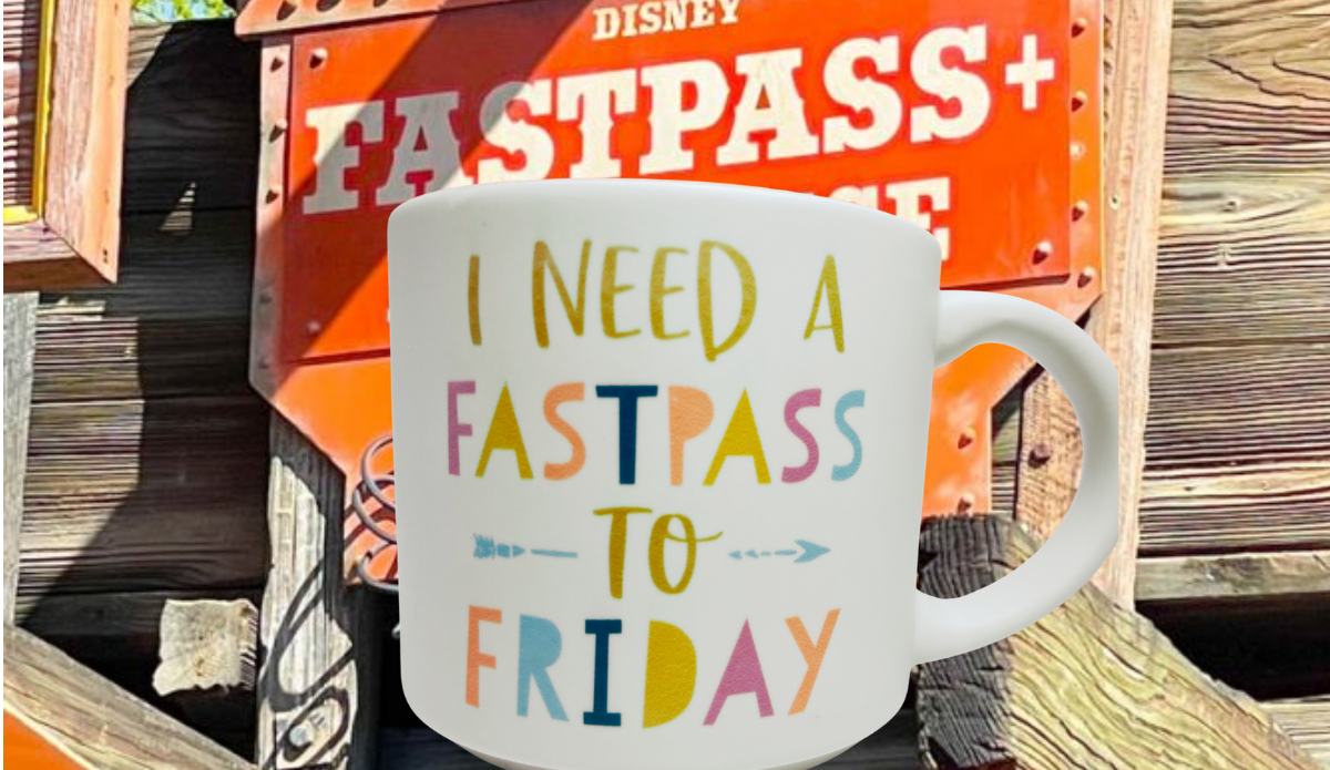 Disney FastPass Mug displayed with Disney FastPass themed attraction background