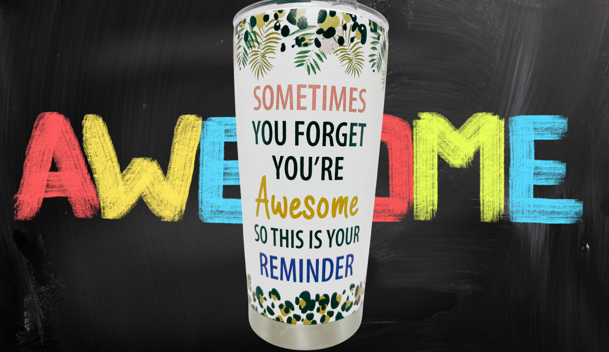 You’re Awesome Stainless Steel Tumbler lifestyle scene with colorful AWESOME chalkboard background