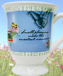 Hallmark butterfly mug displayed in colorful spring wildflower meadow