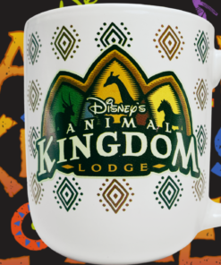 Disney Animal Kingdom Lodge Mug displayed with colorful animal and geometric artwork