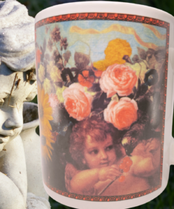 Cafe Arts Raphael Cherubs floral mug displayed beside a stone cherub statue in a garden