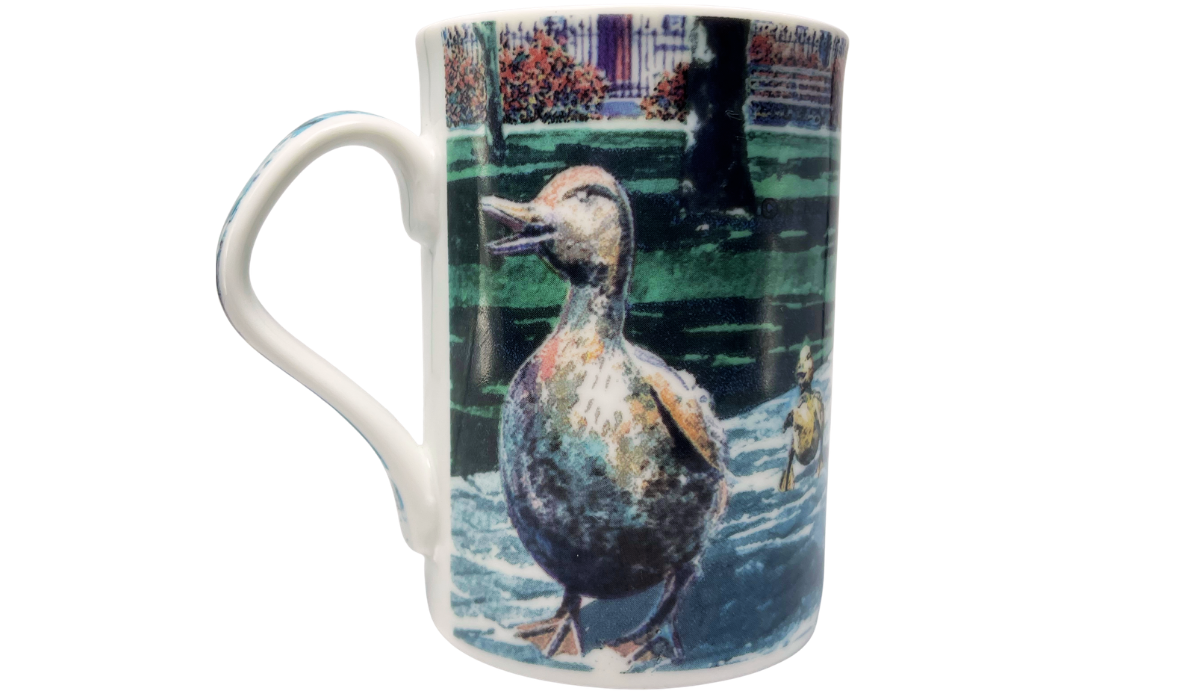 Ducklings II Mug back view featuring a large illustrated duck with smaller ducklings in the surrounding garden landscape.