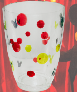 Vintage Disney Mickey Mouse clear acrylic tumbler displayed with Mickey Mouse backdrop