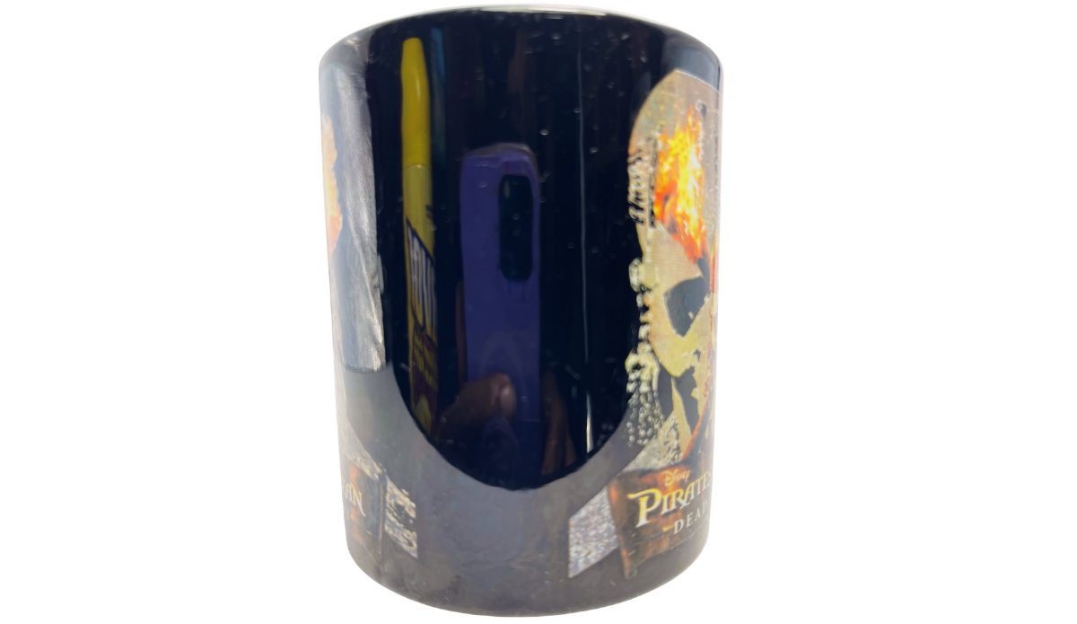 Disney Dead Mans Chest Mug glossy black side with partial fiery pirate artwork