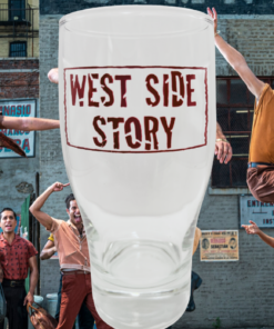 West Side Story pint glass displayed against a dance scene featuring the Jets and Sharks