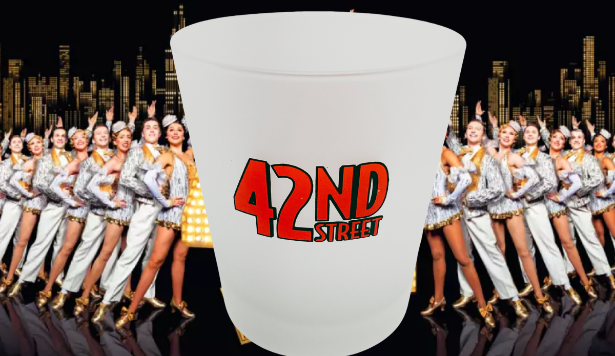 42nd Street Broadway frosted tumbler displayed before ensemble dancers onstage