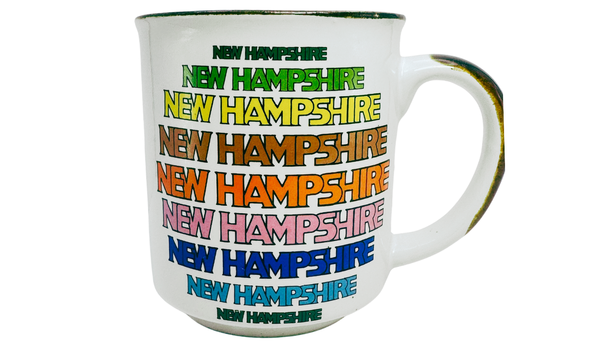 New Hampshire Souvenir Mug front view with colorful stacked New Hampshire lettering and dark-edged rim