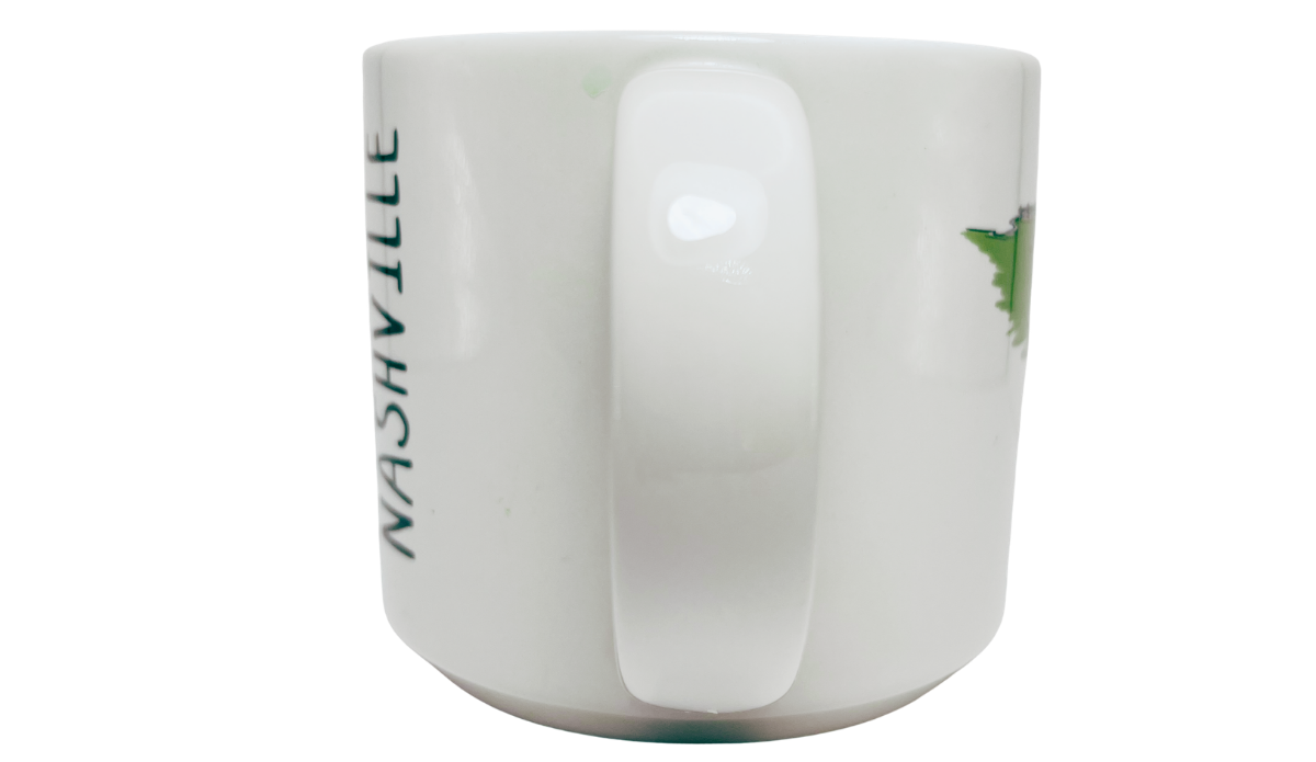 Nashville Tennessee Souvenir Mug handle view with broad white handle and wraparound Nashville artwork at both sides