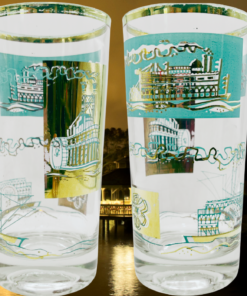 Vintage Southern Comfort Riverboat glass shown in two views against illuminated paddlewheel riverboats at night
