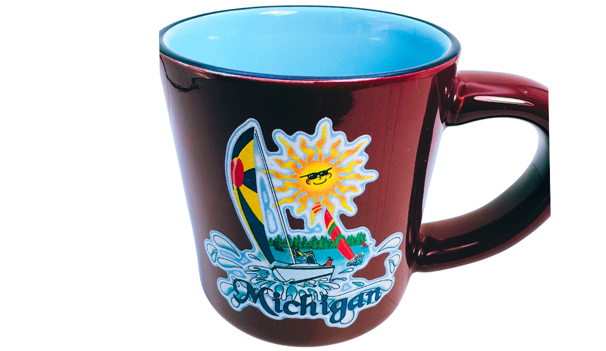 Michigan Sailboat Souvenir Coffee Mug inside view showing bright blue interior and deep red exterior