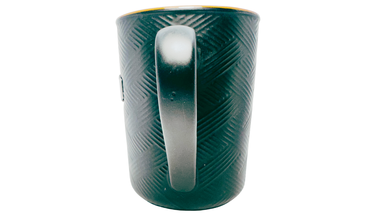 Great Smoky Mountains Medallion Souvenir Mug handle view with black handle and embossed basket weave texture